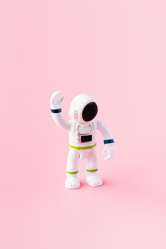 Astronaut Model on Pink Background
